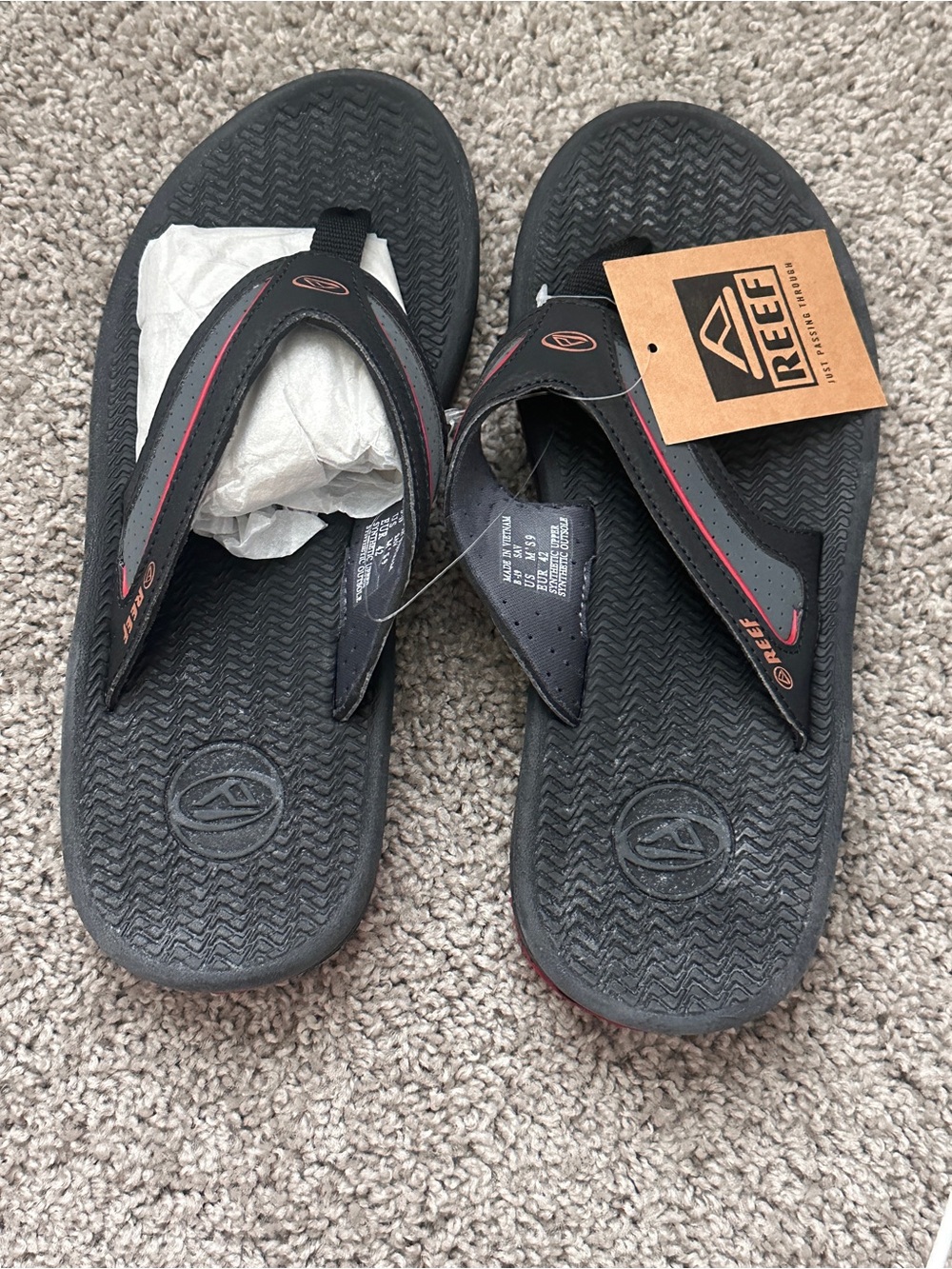Reef Men’s Black Flip Flops with Red Accent